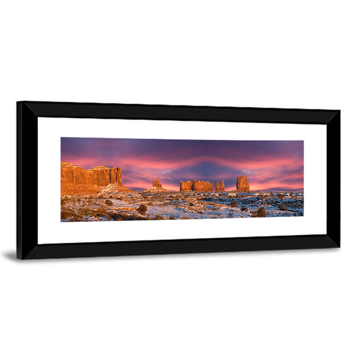 Snow-dusted Monument Valley Sunset Wall Art as a framed print