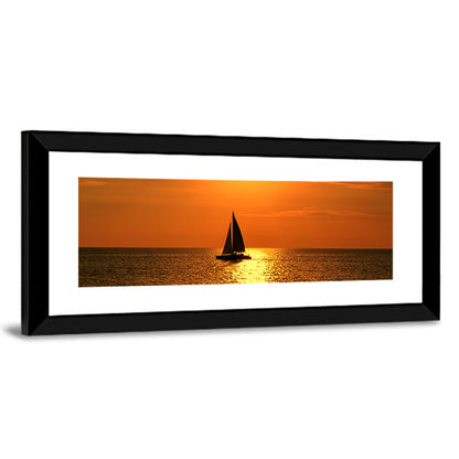 Sailboat Silhouette at Golden Sunset Wall Art