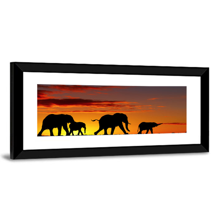 Elephant Herd at Sunset Wall Art as a framed print