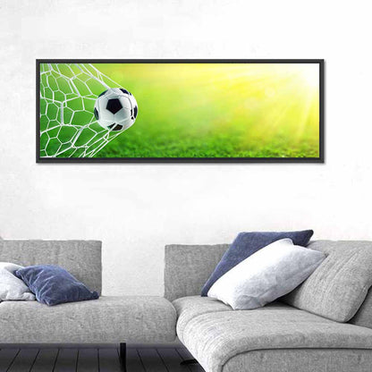 Sunlit Soccer Ball in Net Wall Art