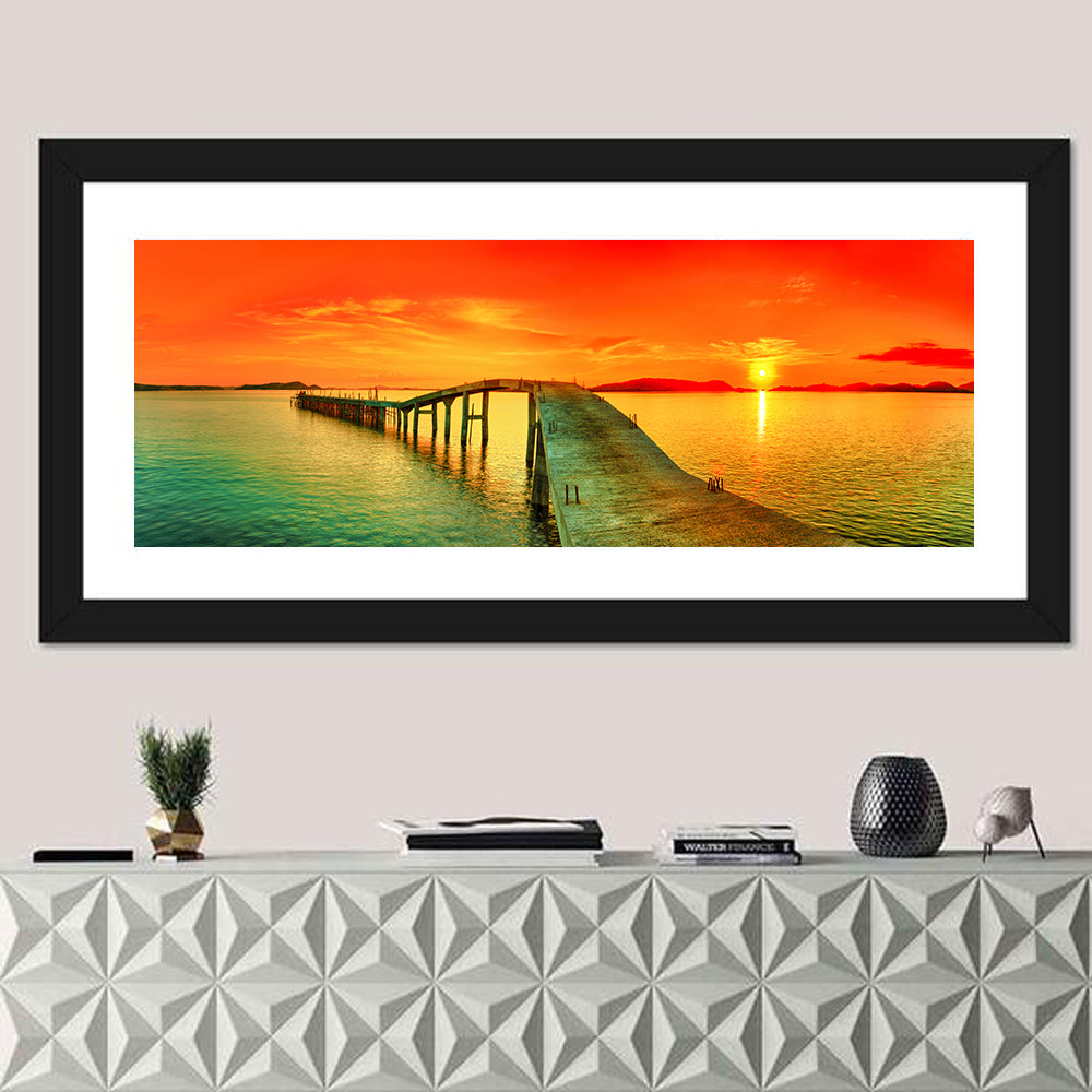 Sea Pier Sunset Wall Art in a room, panoramic
