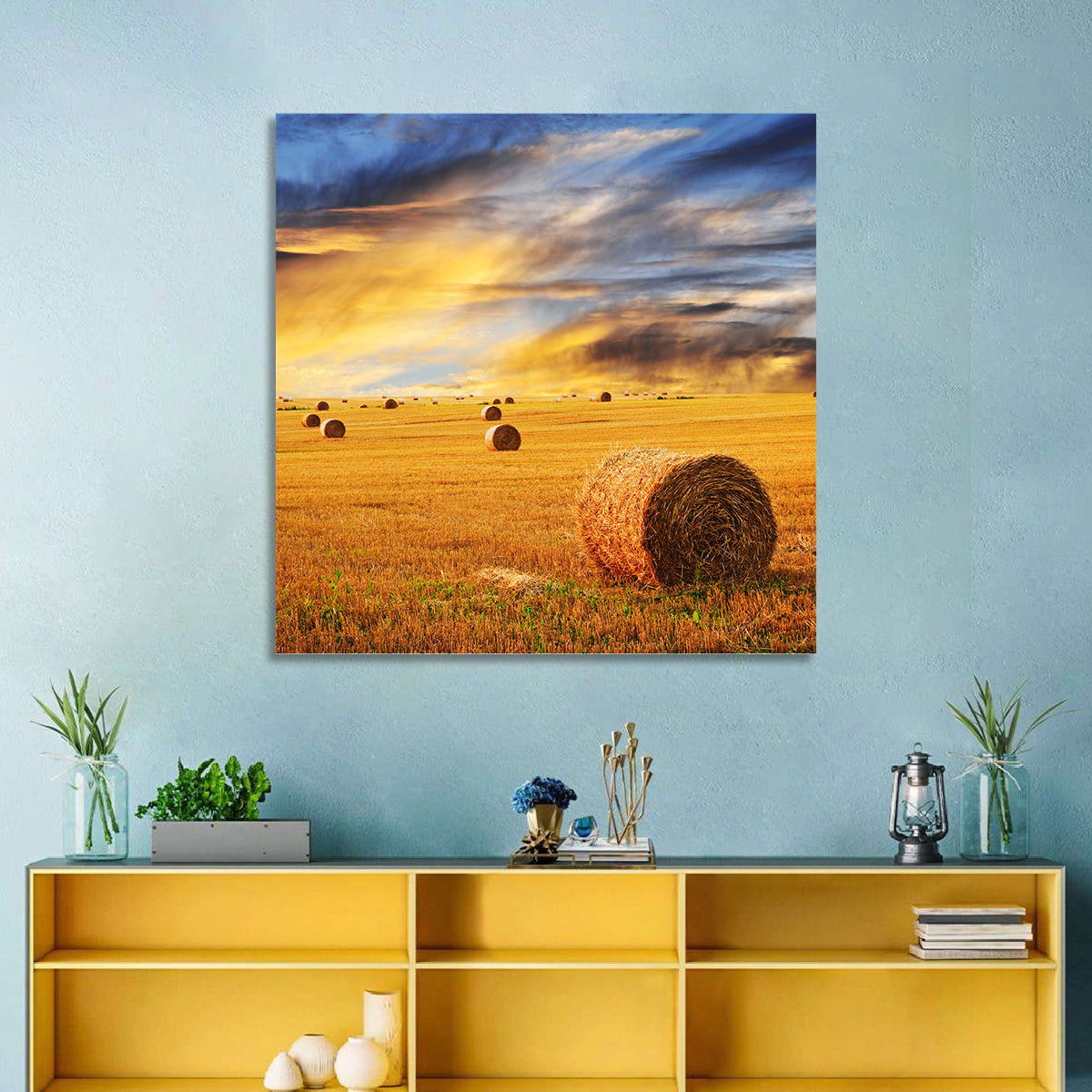 Sunset Over Hay Bales Wall Art in a room, square