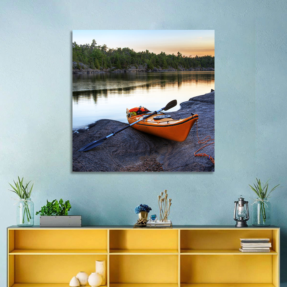 Orange Kayak on Rocky Shore Wall Art