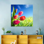 Dewy Red Tulips Under Blue Sky Wall Art