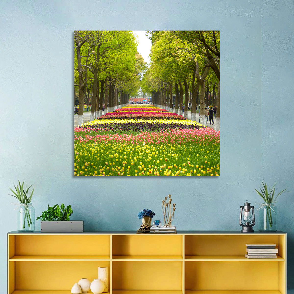 Tree-lined Tulip Garden Path Wall Art in a room, square