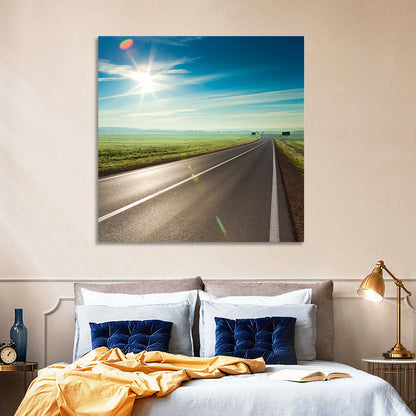 Sunlit Road Through Green Field Wall Art