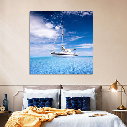 Furled Sails Over Turquoise Water Wall Art