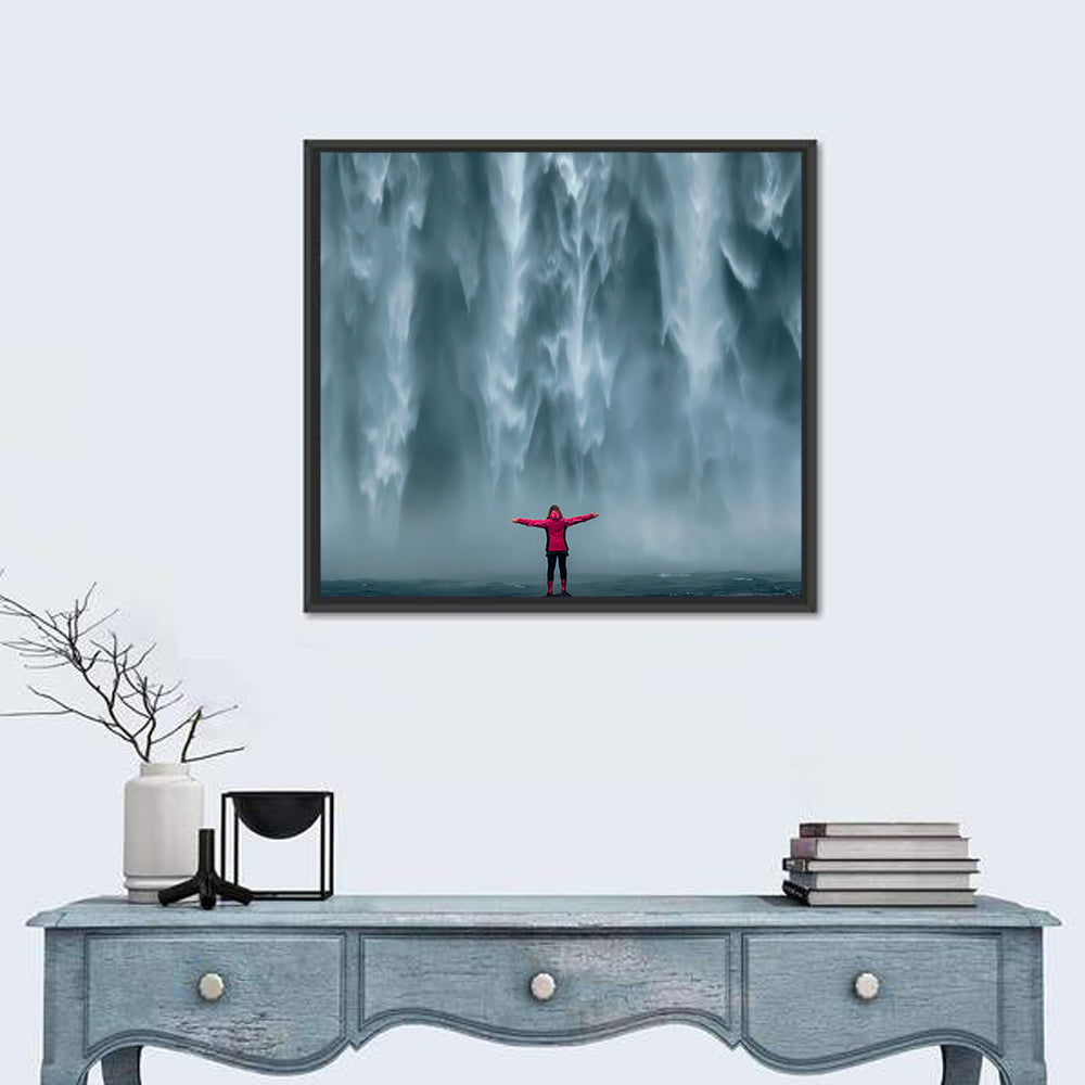 Skogafoss Waterfall with Figure in Pink Wall Art