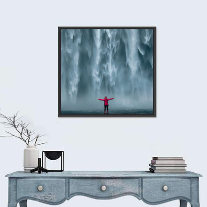 Skogafoss Waterfall with Figure in Pink Wall Art