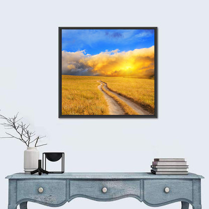 Sunlit Meadow Path with Dramatic Clouds Wall Art
