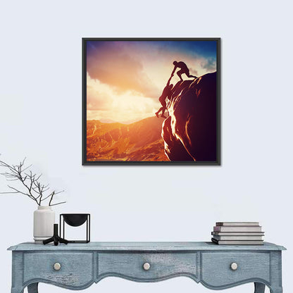 Two Hikers Summit Assist at Sunset Wall Art