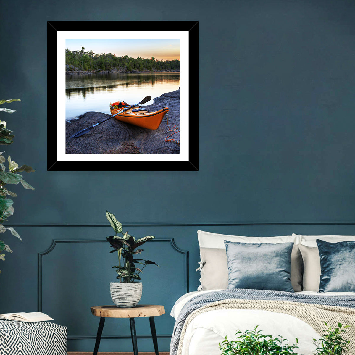 Orange Kayak on Rocky Shore Wall Art