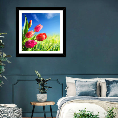 Dewy Red Tulips Under Blue Sky Wall Art