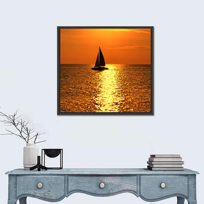 Sailboat Silhouette at Golden Sunset Wall Art