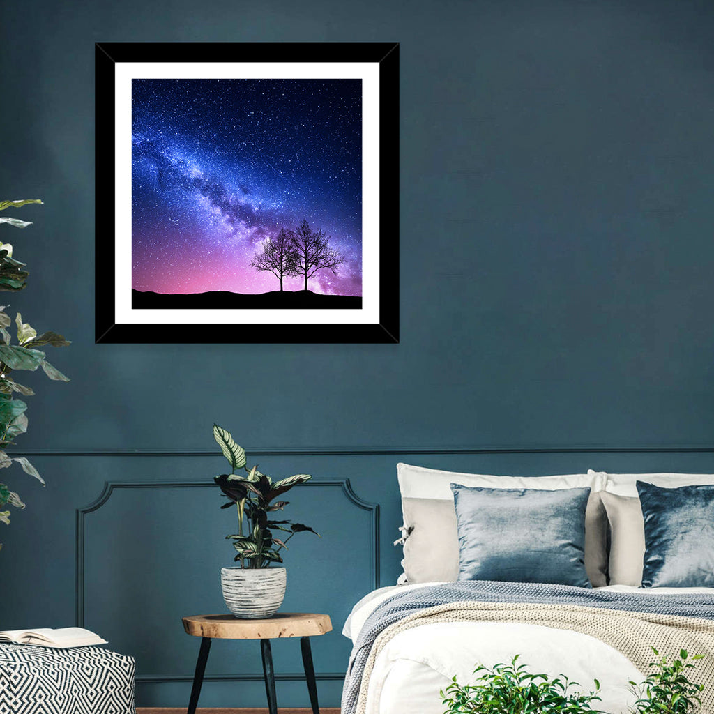 Milky Way Nebula Sky with Silhouetted Trees Wall Art
