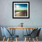 Sunlit Road Through Green Field Wall Art