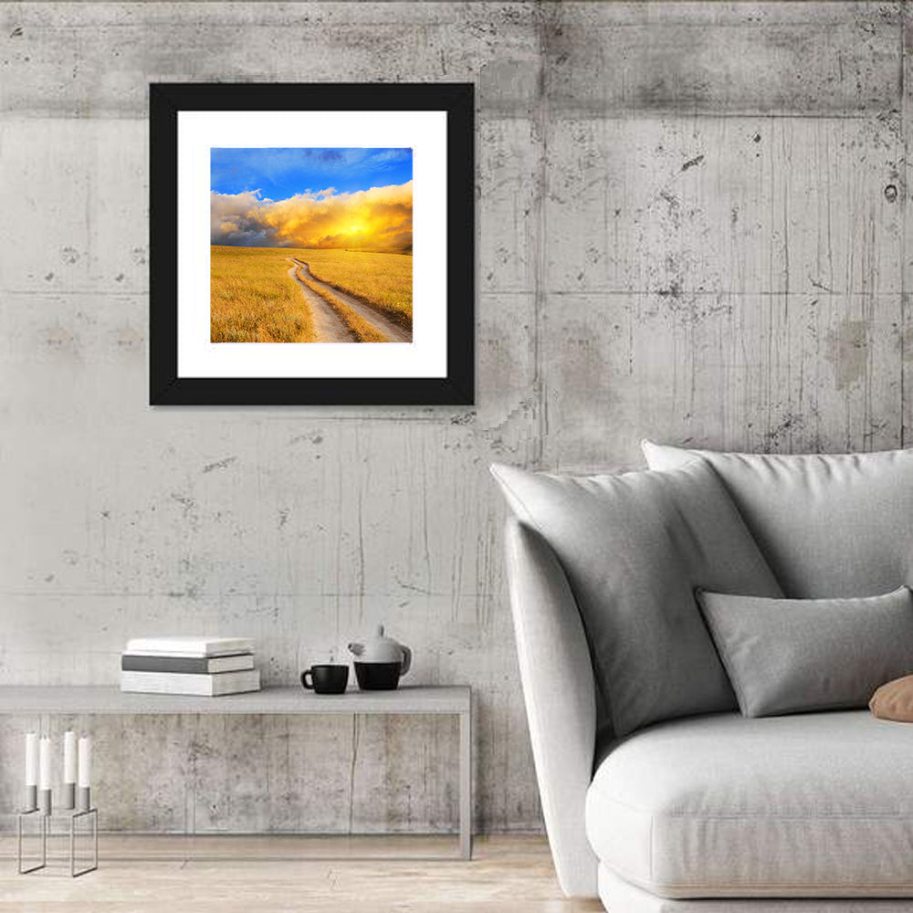 Sunlit Meadow Path with Dramatic Clouds Wall Art