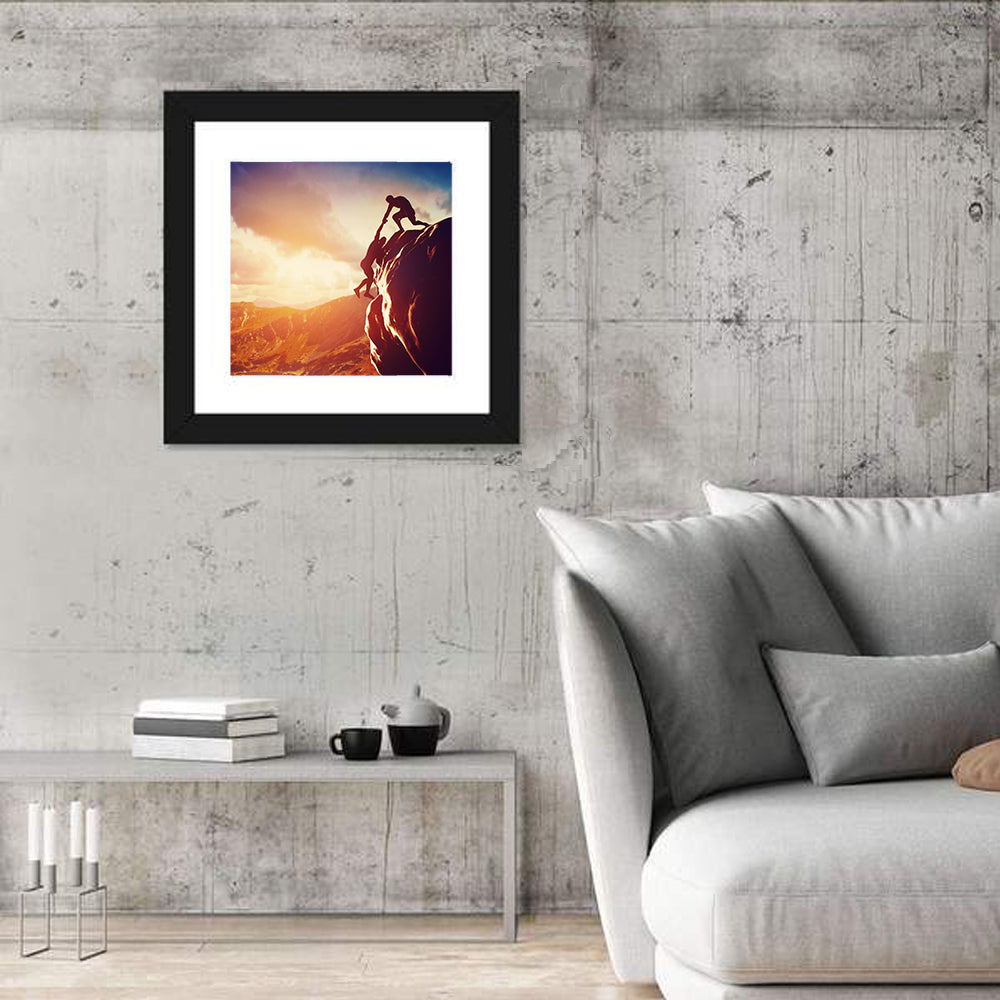 Two Hikers Summit Assist at Sunset Wall Art