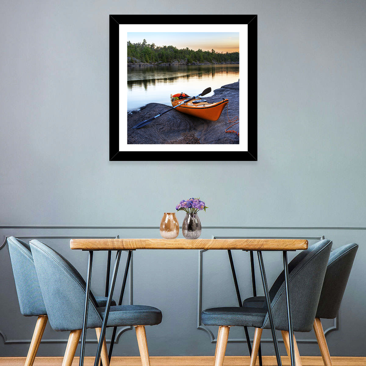 Orange Kayak on Rocky Shore Wall Art