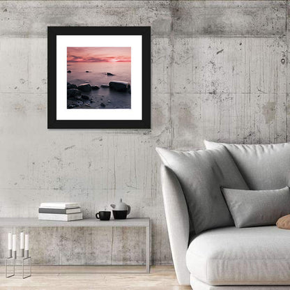 Pink Dusk Lakeshore with Silhouetted Rocks Wall Art