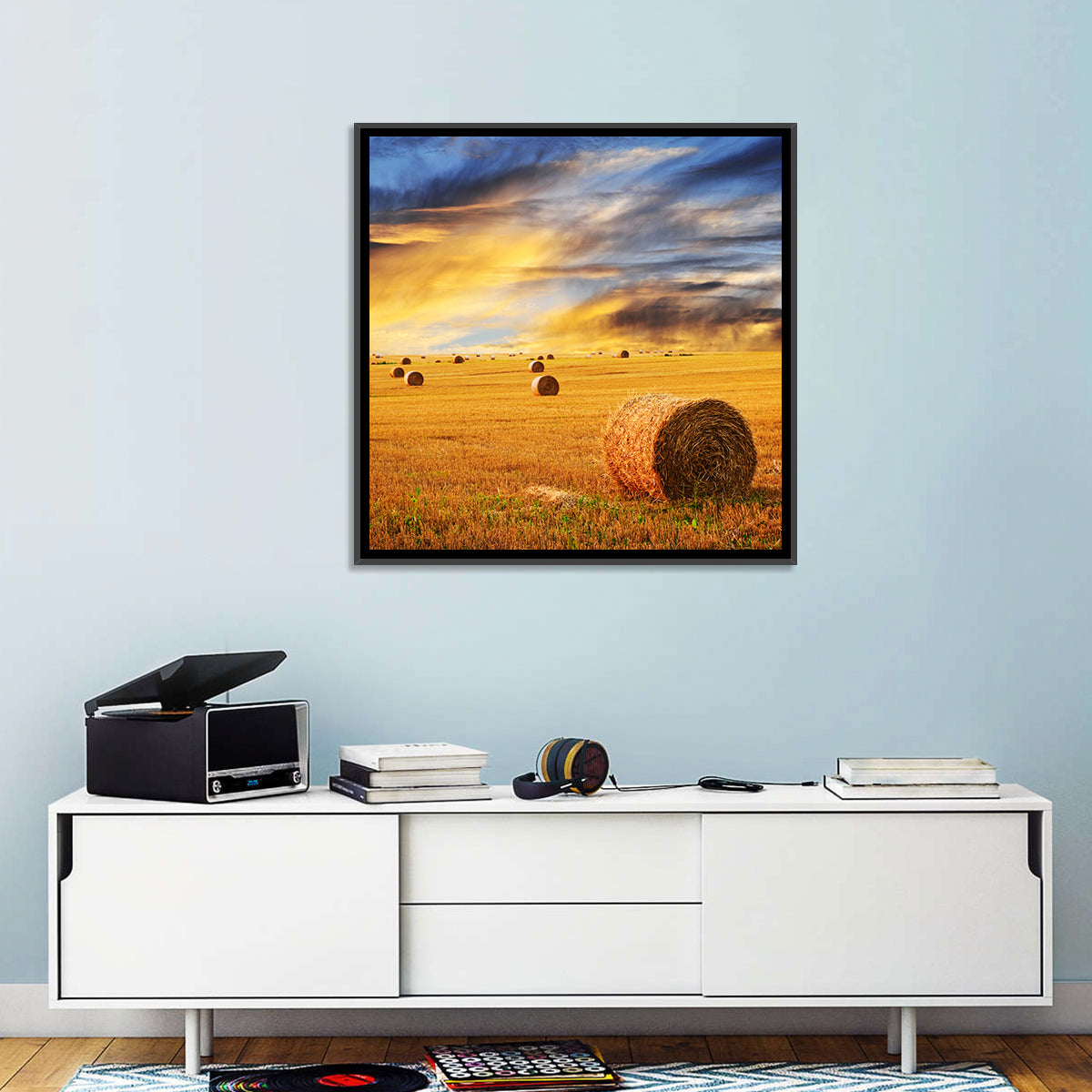 Sunset Over Hay Bales Wall Art in a room, square
