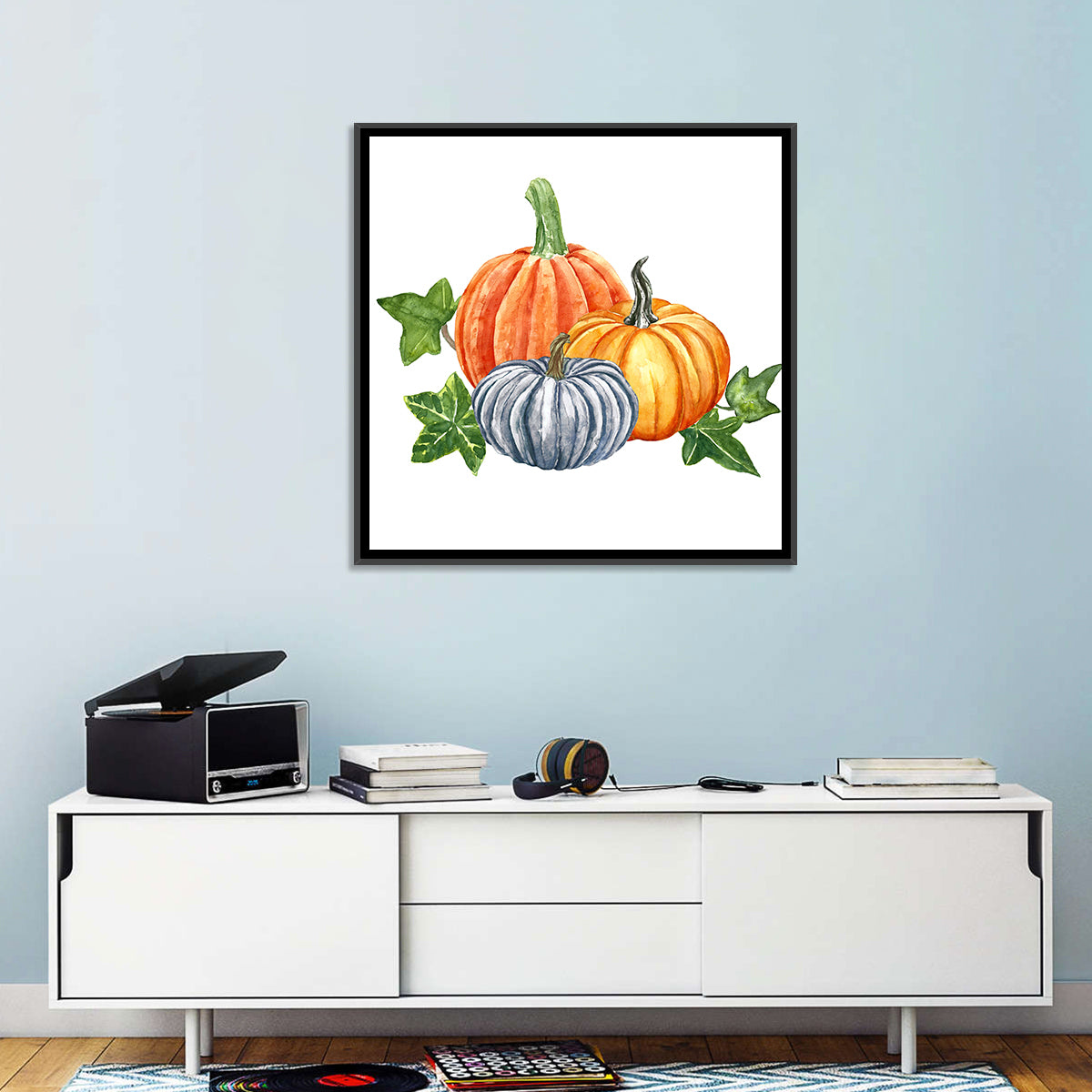 Festive Pumpkin Trio Watercolor Wall Art in a room, square