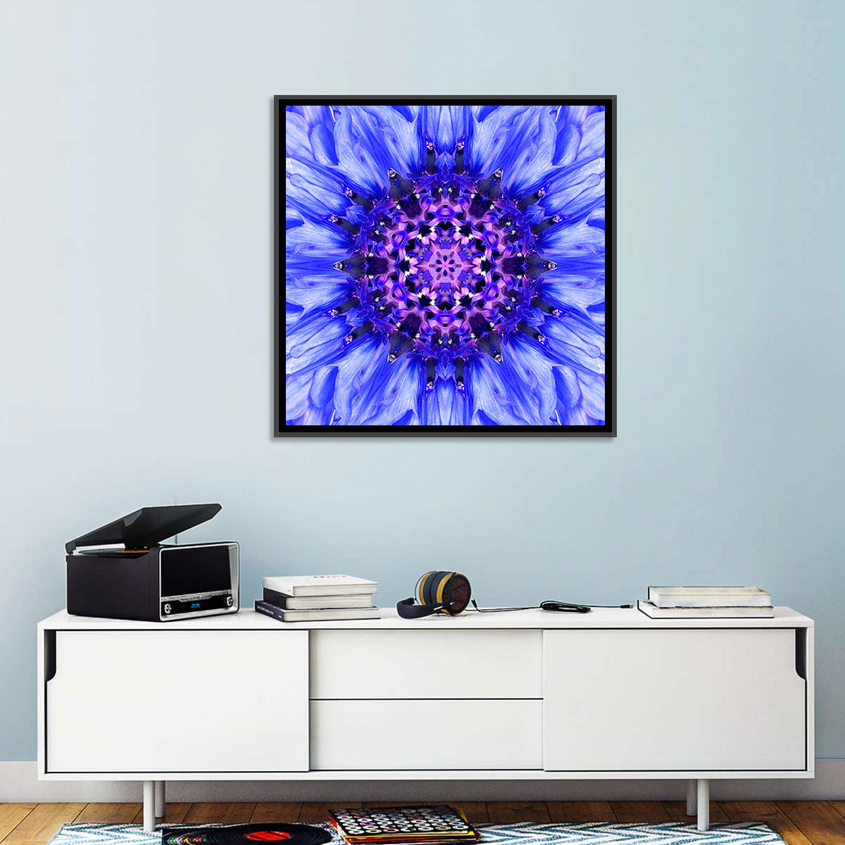 Kaleidoscopic Cornflower Mandala Wall Art in a room, square