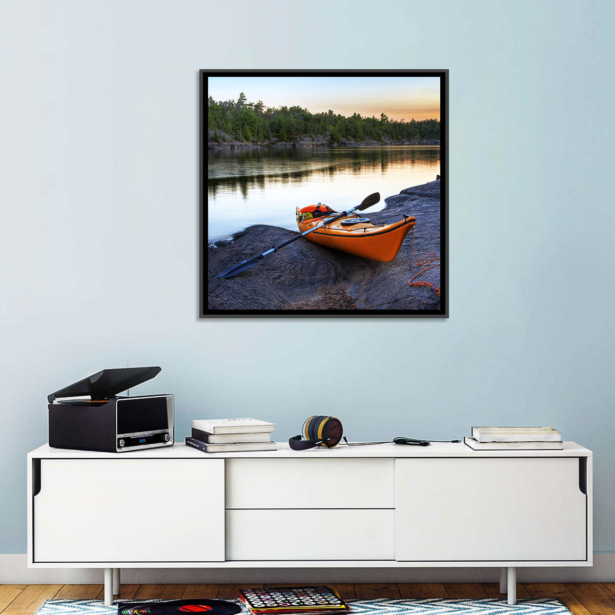 Orange Kayak on Rocky Shore Wall Art