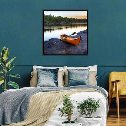 Orange Kayak on Rocky Shore Wall Art