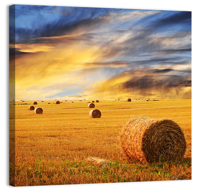 Sunset Over Hay Bales Wall Art as a canvas print