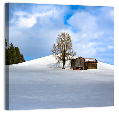 Rustic Barn on a Snowy Hill Wall Art