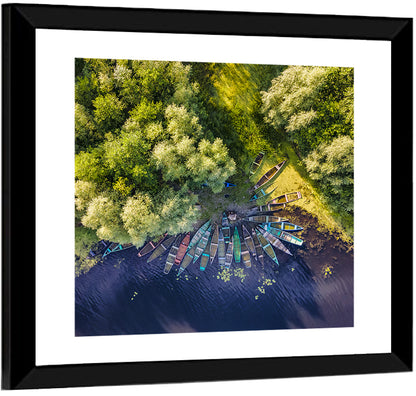 Cluster of Boats Along Forest Shore Wall Art
