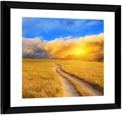 Sunlit Meadow Path with Dramatic Clouds Wall Art