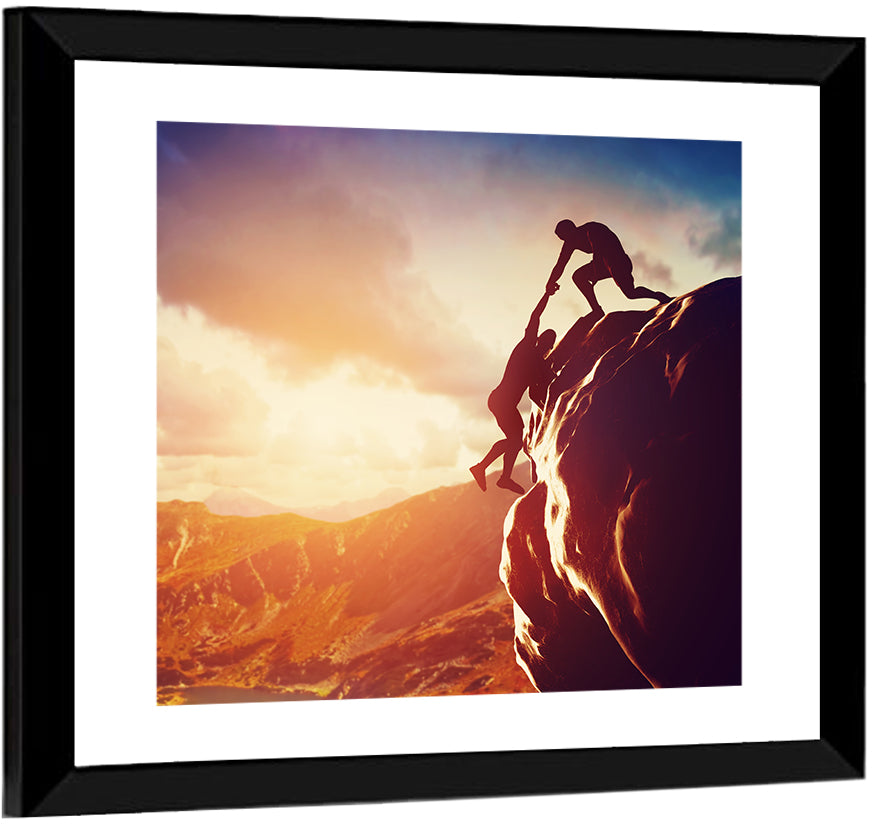 Two Hikers Summit Assist at Sunset Wall Art