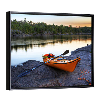 Orange Kayak on Rocky Shore Wall Art