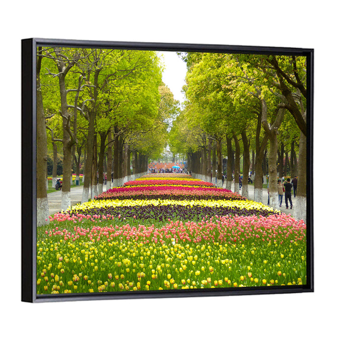 Tree-lined Tulip Garden Path Wall Art as a framed canvas