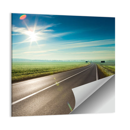 Sunlit Road Through Green Field Wall Art