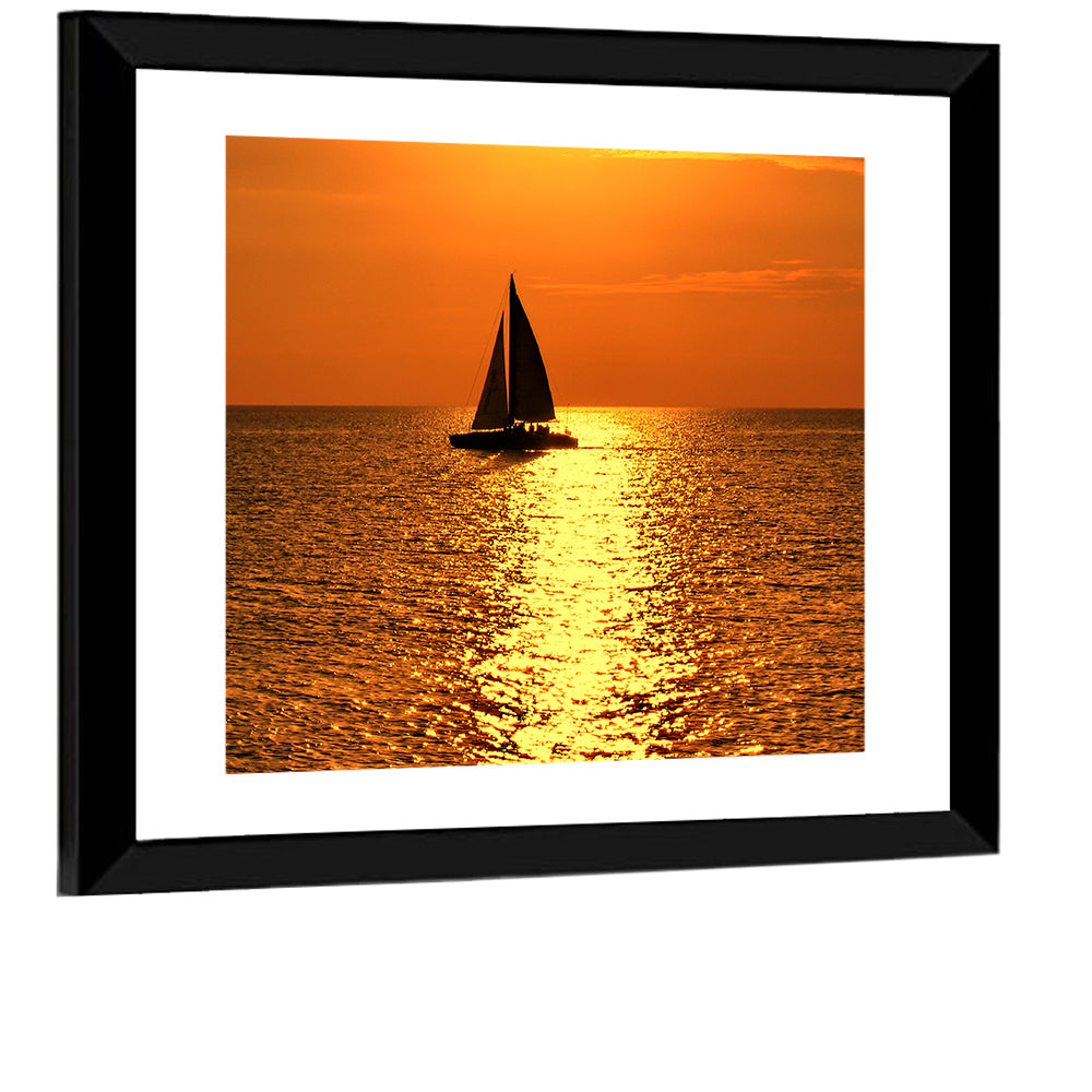 Sailboat Silhouette at Golden Sunset Wall Art