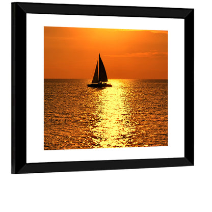 Sailboat Silhouette at Golden Sunset Wall Art