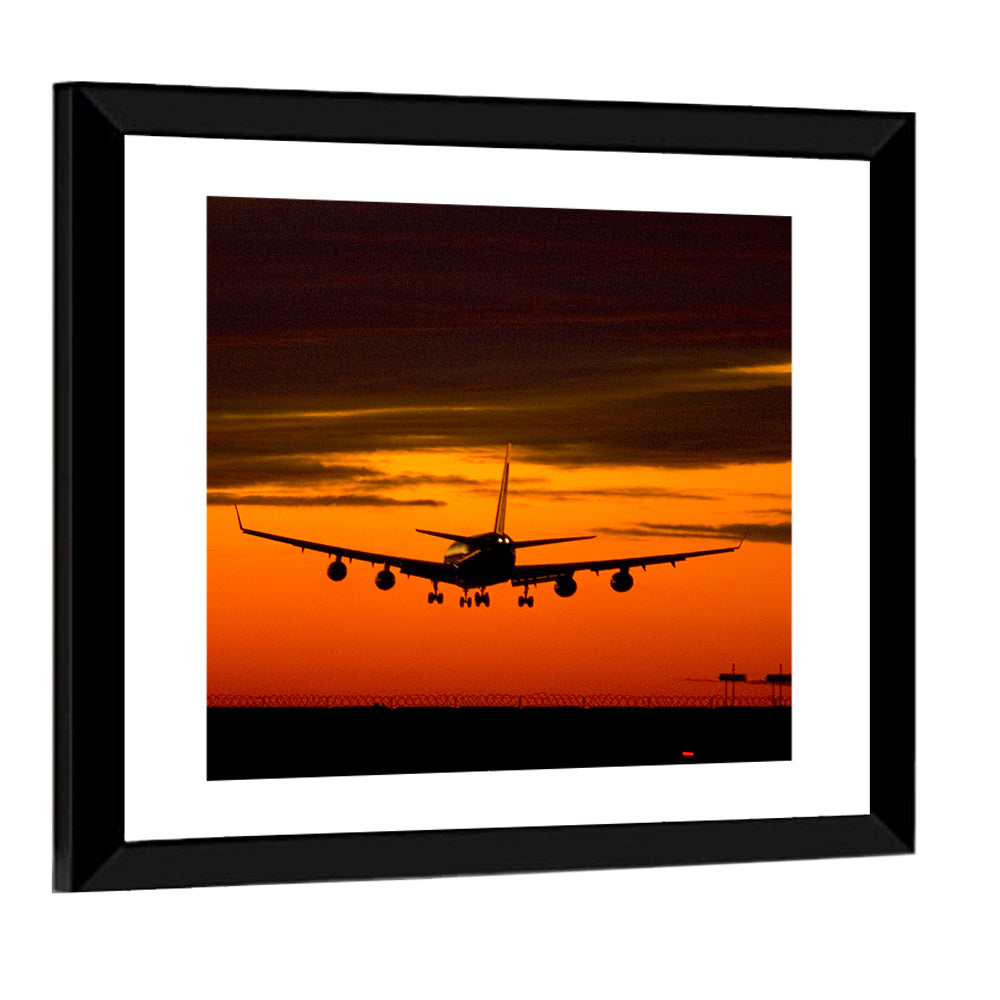 Airplane Landing at Sunset Wall Art
