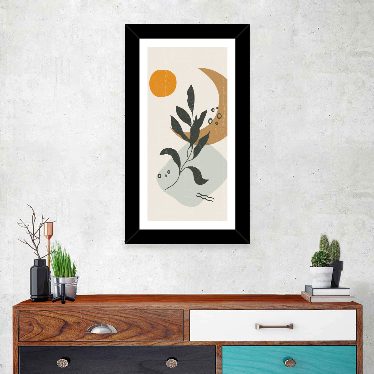 Leafy Branch with Sun and Moon Wall Art in a room, portrait