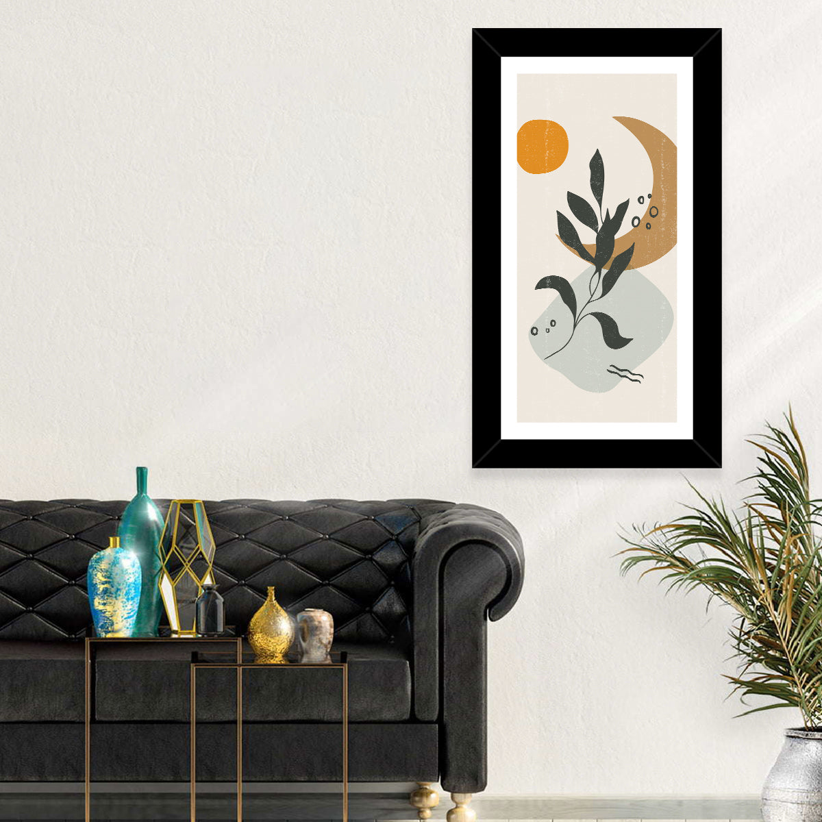 Leafy Branch with Sun and Moon Wall Art in a room, portrait