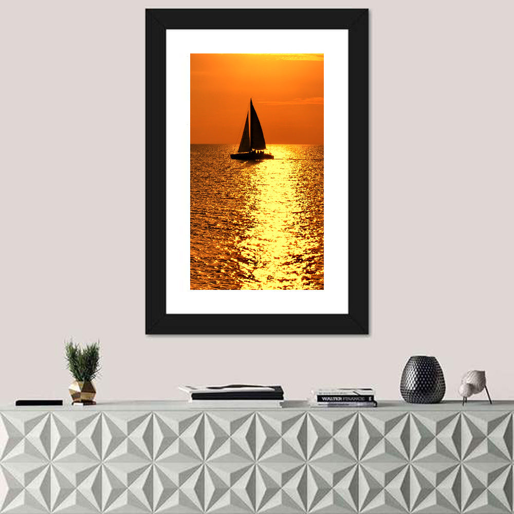 Sailboat Silhouette at Golden Sunset Wall Art