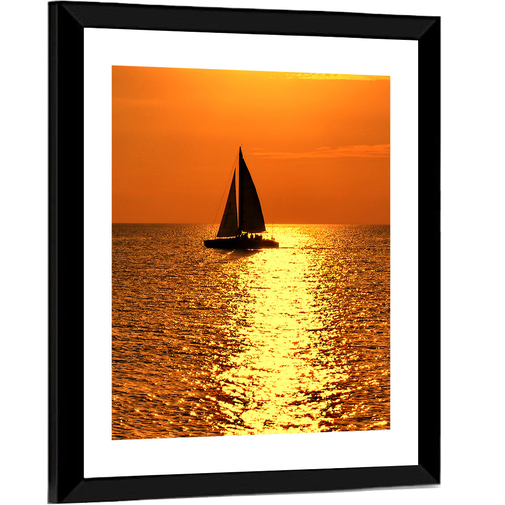 Sailboat Silhouette at Golden Sunset Wall Art