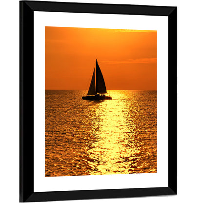 Sailboat Silhouette at Golden Sunset Wall Art